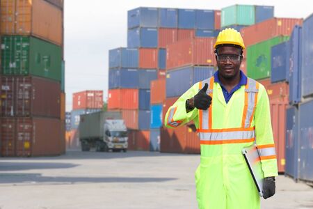 Engineer on site, he is working control logistics or import export industryの写真素材