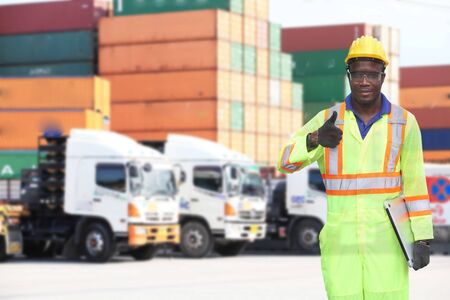 Engineer on site, he is working control logistics or import export industryの写真素材