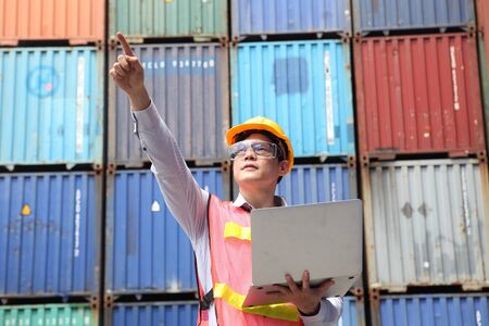 Engineer on site, he is working control logistics or import export industryの写真素材