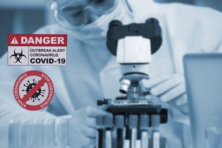 Doctor analyze corona or covid-19 blooding tube, he is finding the sample vaccine in laboratory and...