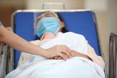 Doctor and patient  wearing facemasks during coronavirus and flu outbreak. Virus and illness protection, home quarantine. COVID-2019の写真素材