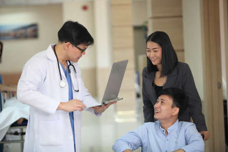 Doctor and patient  discuss for health check details in hospitalの写真素材