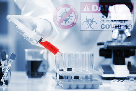 Laboratory research. Team work Scientists  study data and evaluating microscope success. they are...