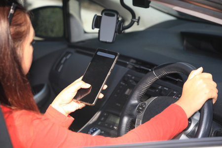 woman call and driving in carの写真素材