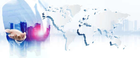 Business man touching on world map screen for social and connectivity concept,Back view of businessman in night city looking at globe with network. Global networking and international business conceptの写真素材