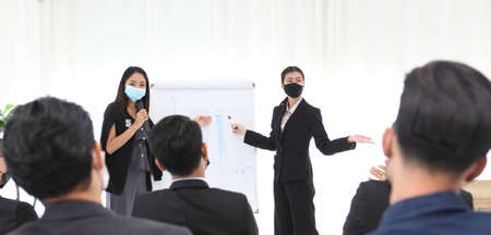 Speaker at Business Conference and Presentation. Audience at the conference hall.Speaker Giving a Talk at Business Meeting. Audience in the conference hall.の写真素材