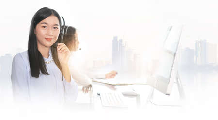 woman agent with headsets working in a call centre,Call center agent with headset working on support...