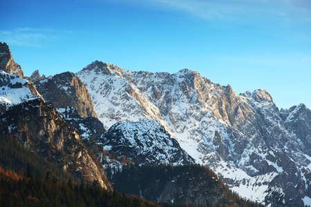 Snow covered mountain peak winterの写真素材