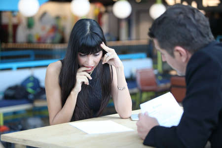 Businesswoman and businessman HR manager interviewing woman. Candidate female sitting interviewers...