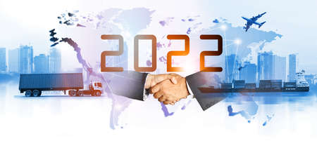 Double exposure of 2022 new year for delivery industry and logistics concept container truck ,ship in port and freight cargo plane in transport and import-export commercial logisticの写真素材