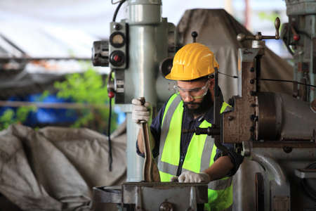 engineer on site working for production or maintenance  big machine industry in factoryの写真素材