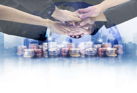 The world lInternational financial consulting and rows of coins for finance and banking concept with business background.の写真素材