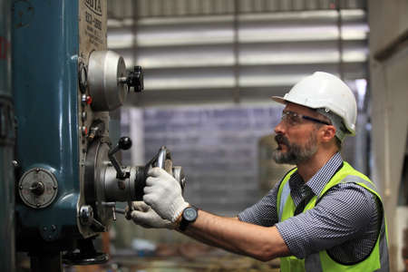 engineer on site working for production or maintenance  big machine industry in factoryの写真素材