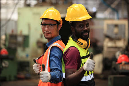 engineer on site working for production or maintenance  big machine industry in factoryの写真素材