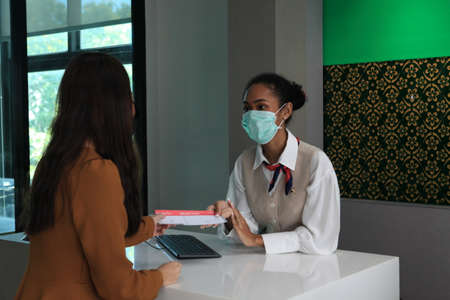 Airport security check at gates  to people going on trip  to terminal entrance while wearing sterile...