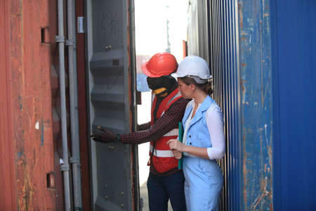 Team of  people, worker  Foreman, enginee in shipping yard. Concept of transportation, logistics.
