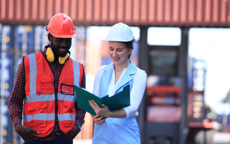 Team of  people, worker  Foreman, enginee in shipping yard. Concept of transportation, logistics.