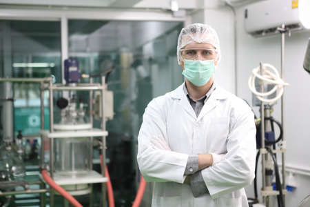scientist  analyzing a biological and ecological hemp plant used for herbal pharmaceutical CBD oil...