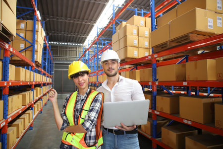 Portrait of worker in warehouse, they happy and working at The Warehouse. Storehouse area, Shipment....
