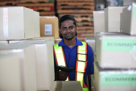 Portrait of worker in warehouse, they happy and working at The Warehouse. Storehouse area, Shipment....