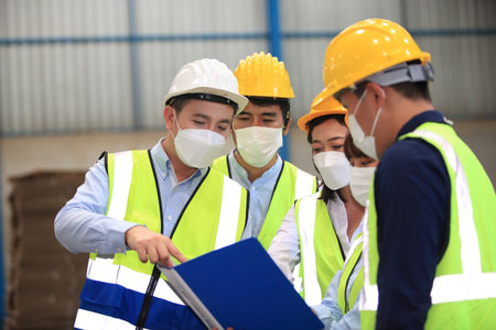 engineer team  meeting before working ,Business of  the logistic distribution or transportation Industry or shipping business, Container Cargo shipment  delivery , import exportの写真素材