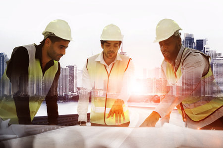 engineering team working on siteの写真素材