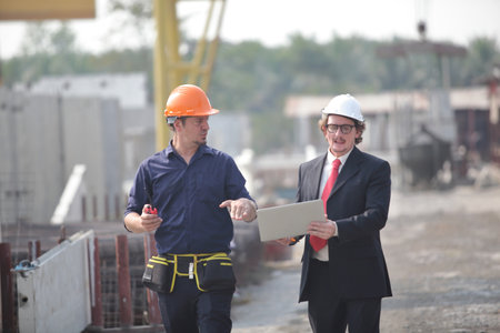 engineering team working on siteの写真素材