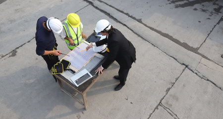 engineering team working on siteの写真素材
