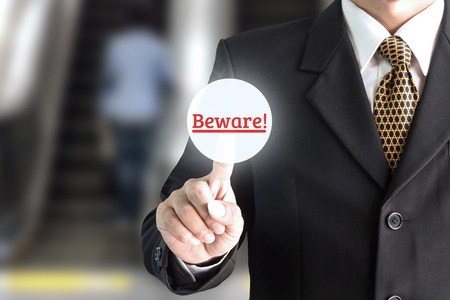 Businessman hand pointing on the screen keypad careful - can be used for editing text or image of your fingers.の写真素材