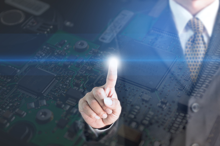 Businessman touch screen Metal Screen Background Electronic Circuit Nick.の写真素材