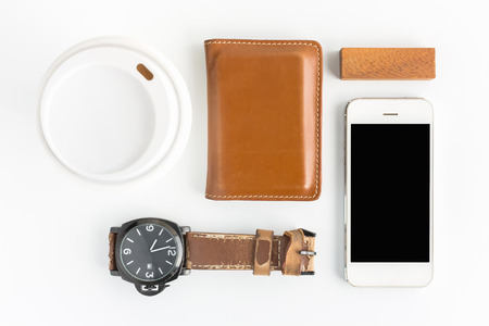 wallet with Watch and coffee cup, flat lay, top view backgroundの写真素材