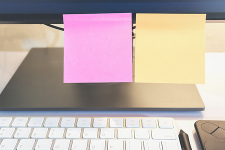 Abstract of blank paper and stick paper on laptop. paper note copy space, Design can also enter text in the ad.の写真素材