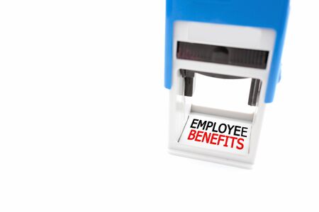 Stamper labeled Employee Benefits on white backgroundの写真素材