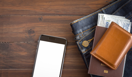 travel accessories costumes copy space. Passports, jean and phone. Top view.の写真素材