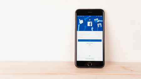Bangkok, Thailand - August 24, 2017: Login Screen Facebook icons on Apple IPhone. largest and most popular social networking site in the world.のeditorial素材