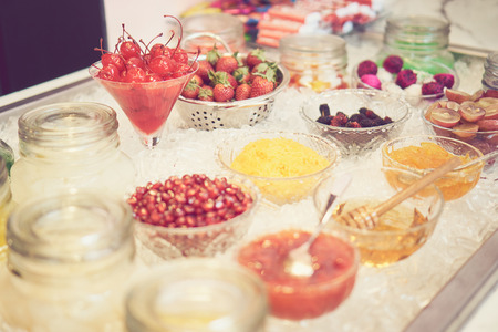 selective focus of Various kinds of sweet food in glass, in the candy store. vintage toneの写真素材