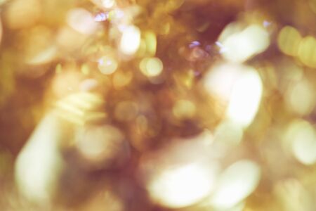 Blur background of gold color bokeh light, Popular in the general festival. Make the luxury image in your work piece.の写真素材