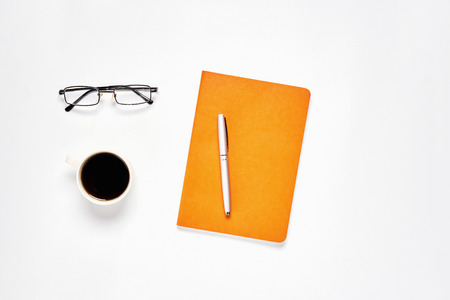 Black screen notebook blank and pen placed white background. Suitable for graphics used for advertising.の写真素材