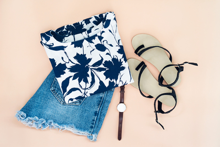 flat lay of woman clothes and accessories set with shoes, watch. Trendy fashion female background.の写真素材