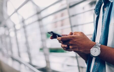 Man holding a smartphone. using cell phone on lifestyle. Technology for communication concept.