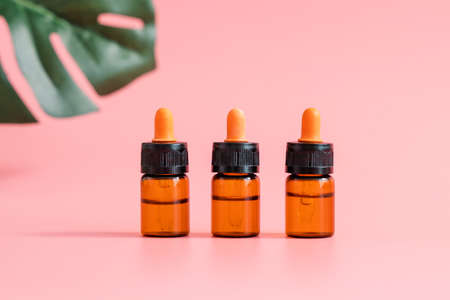Medicine bottle placed, Blank label package for mock up on a pink background. The concept of natural beauty products.の写真素材