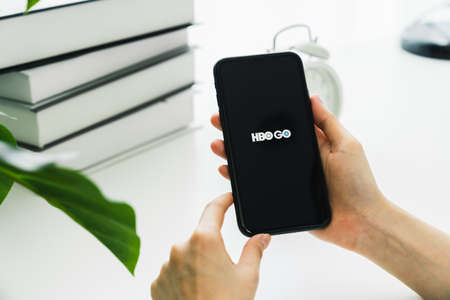 Bangkok, Thailand - September 5, 2020 : Facebook screen on apple iphone 11 and iPad on the table, Social media are using for information sharing and networking.のeditorial素材