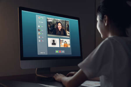 Asian businesswoman making video call meeting to team online and present work projects. Concept...