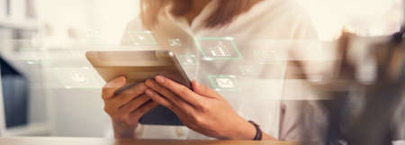 Stock exchange market concept, businesswoman hand trader press digital tablet with graphs analysis...