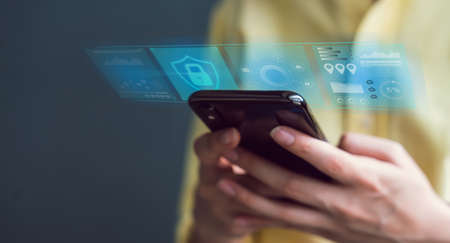 Technology concept with cyber security internet and networking, woman hand using smartphone, screen...