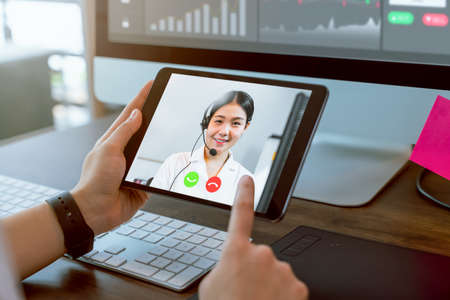 Businesswoman making video call to customer support online.