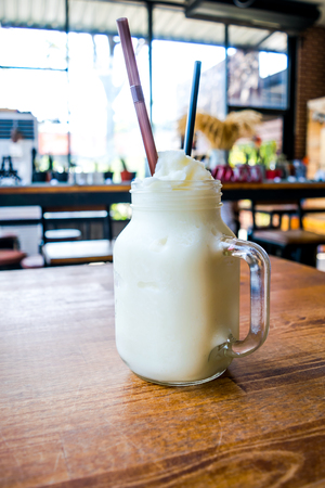 A mug of Milkshake on the cafe in the nice holiday for dealing Businessの写真素材
