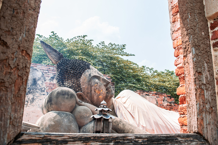 View of reclining Buddha at Wat Phutthaisawan which is the ancient Buddhist temple in the Ayutthaya Historical Park, Ayutthaya province, Thailand.の写真素材