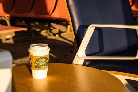 Chiba, Japan - March 24, 2019: View of Starbucks coffee cup with brand logo at Narita International Airport, Chiba, Japan.のeditorial素材