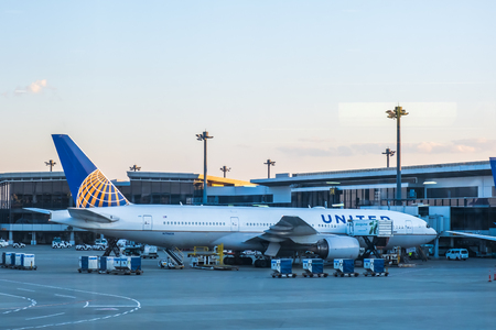 Chiba, Japan - March 24, 2019: View of United Airlines plane, a major American airline headquartered at Willis Tower in Chicago, Illinois, parking at Narita International Airport, Chiba, Japan.のeditorial素材